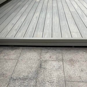 antique wood composite deck picture frame border step edge trim detail close up