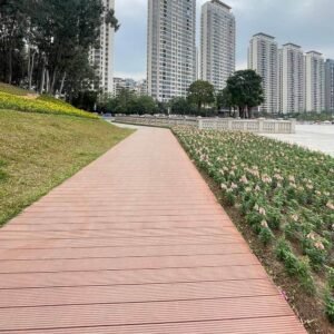 teak and rosewood grooved wpc decking installed as public park boardwalk pathway